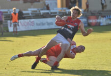 Demons go up in tight battle