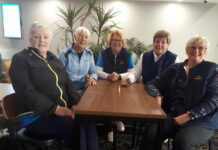 Winds give golfers a tough challenge