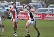 Saints march on in tight contest