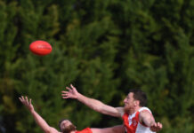 Roosters on track after close victory